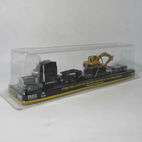 Norscot Peterbilt model 389 with trail king Lowboy trailer and CAT 315C