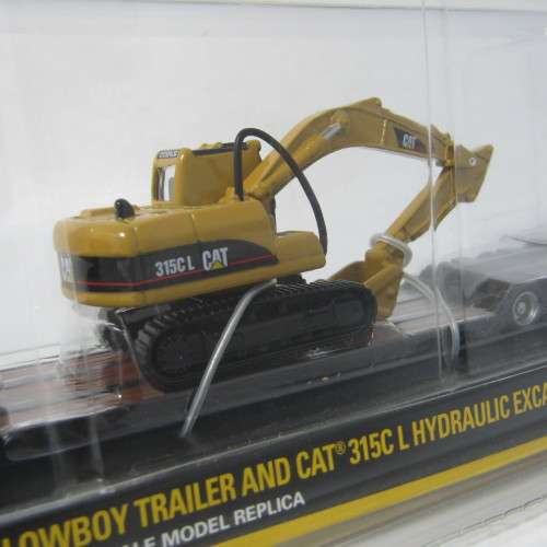 Norscot Peterbilt model 389 with trail king Lowboy trailer and CAT 315C