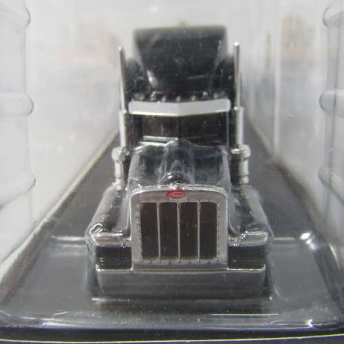 Norscot Peterbilt model 389 with trail king Lowboy trailer and CAT 315C