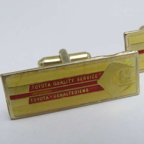 Pair of vintage Toyota Quality Service cufflinks