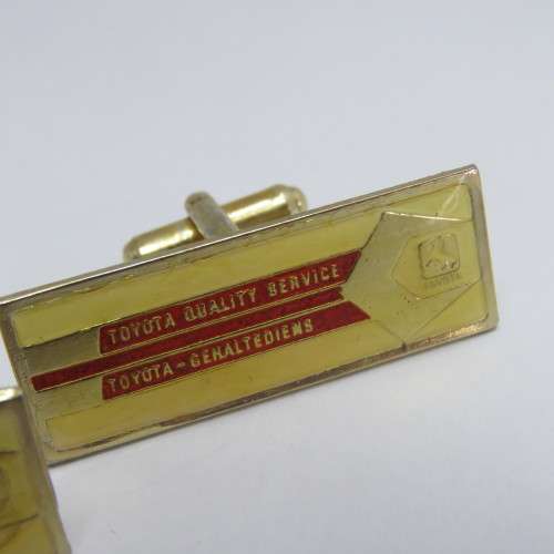 Pair of vintage Toyota Quality Service cufflinks