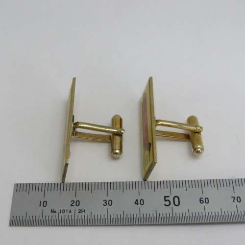 Pair of vintage Toyota Quality Service cufflinks