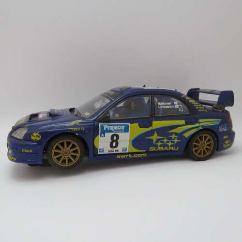 SCX Subaru Impreza WRC slot car - Wing repaired - 4 Wheel drive