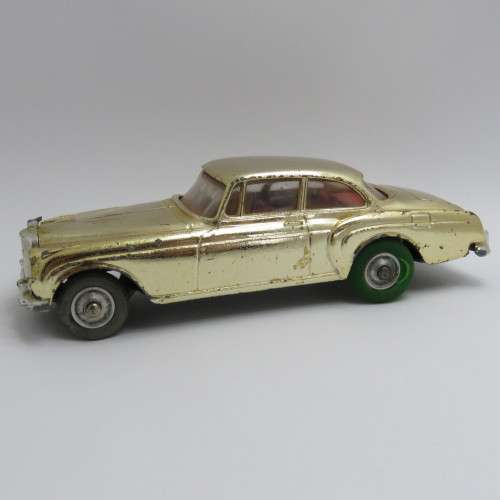 Corgi Toys 224 Bentley Continental Sports Saloon gold edition - Needs tyres - Steering rack broken