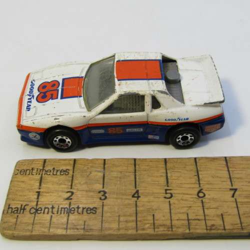 1985 Matchbox Pontiac Fiero racing toy car - scale 1/56