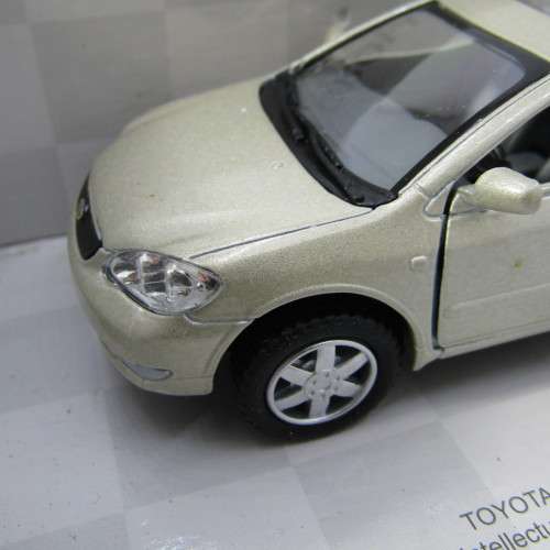 KinSmart Toyota Corolla model car in box - scale 1/36
