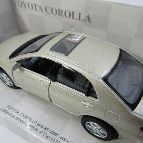 KinSmart Toyota Corolla model car in box - scale 1/36
