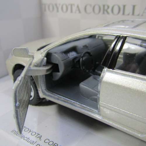 KinSmart Toyota Corolla model car in box - scale 1/36