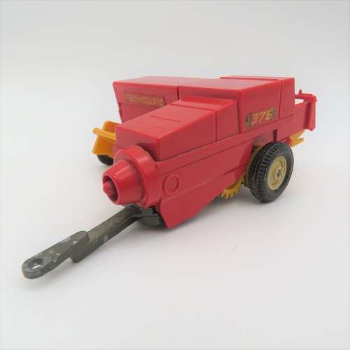 Britain`s New Holland 376 baler - one wheel broken