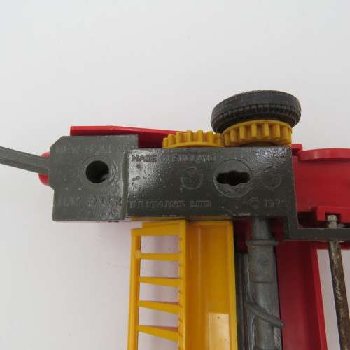 Britain`s New Holland 376 baler - one wheel broken