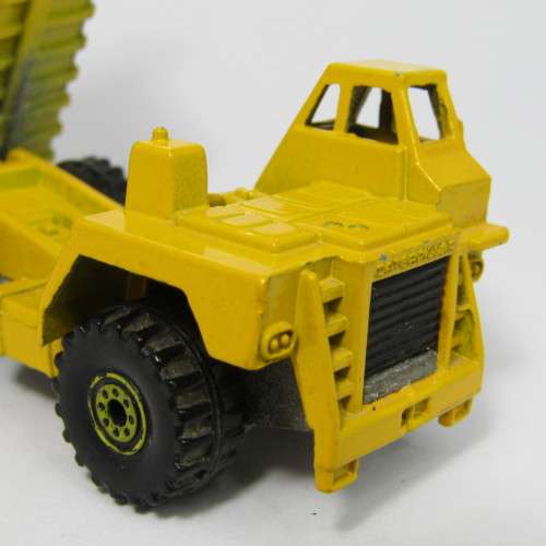 Hot Wheels Caterpillar dump truck toy car