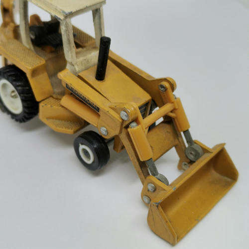 ERTL International backhoe loader die-cast tractor