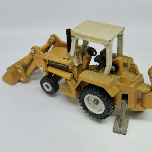 ERTL International backhoe loader die-cast tractor