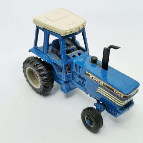 ERTL Ford TW-35 tractor with baler - scale 1/64