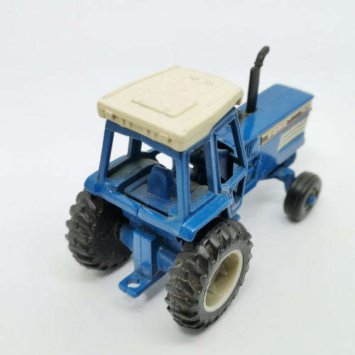 ERTL Ford TW-35 tractor with baler - scale 1/64