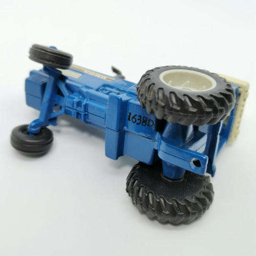 ERTL Ford TW-35 tractor with baler - scale 1/64