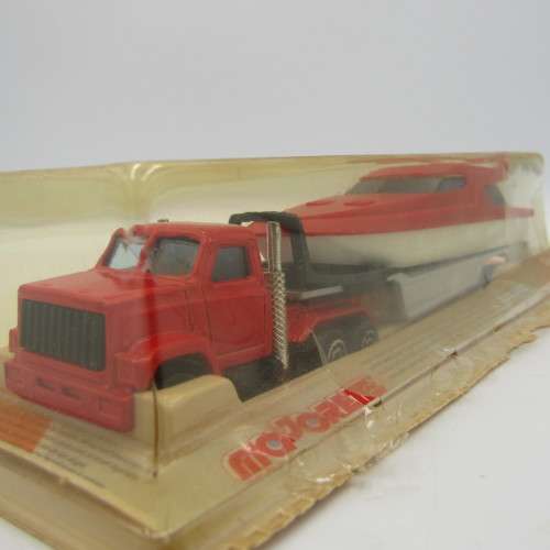 Majorette die-cast truck with yacht on trailer