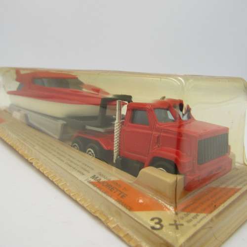 Majorette die-cast truck with yacht on trailer