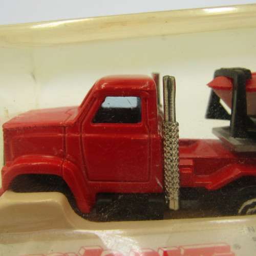 Majorette die-cast truck with yacht on trailer