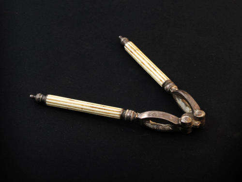 Antique nutcracker with bone handles