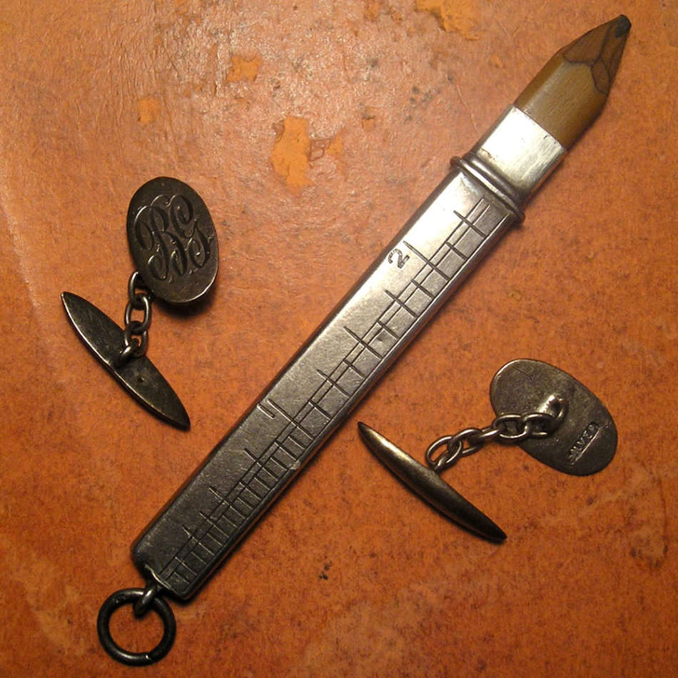Silver Pencil Holder Doubling as Inches Measuring Rod and Pair of Silver Cuff Links