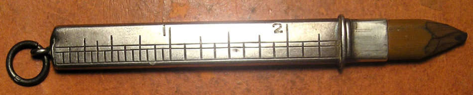 Silver Pencil Holder Doubling as Inches Measuring Rod and Pair of Silver Cuff Links