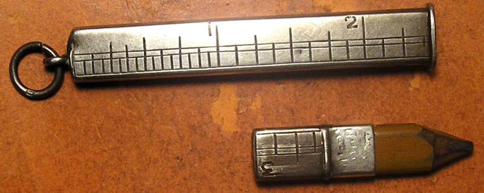 Silver Pencil Holder Doubling as Inches Measuring Rod and Pair of Silver Cuff Links