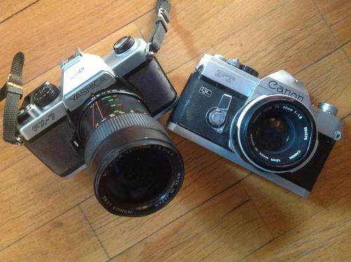 Two SLR's. Yashica FX 7 & Canon FT. Fully functional but some damage to bodies