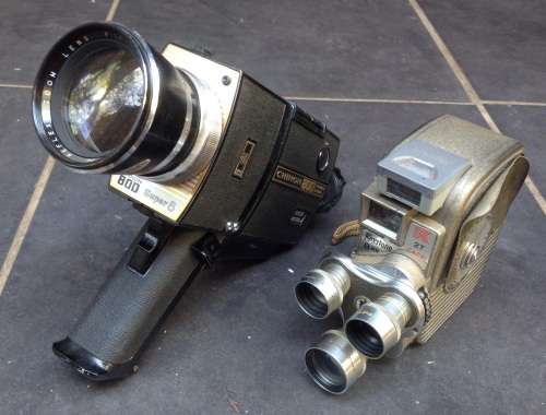 Two vintage movie cameras (display only)