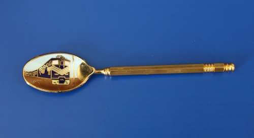 Interesting Blue train spoon, gold finish with