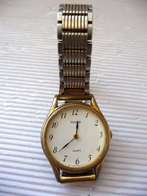 Vintage Ladies Pulsar Quartz Watch with original Stainless Steel Clip Strap.