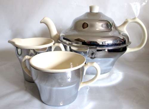 Art Deco Ceramic & Chrome Insulated 3 Piece Tea Set. Please note repairs on Sugar Pot handle.