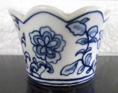 Small Blue and White handpainted fase or planter. No Marked with makers mark. 60mm high.