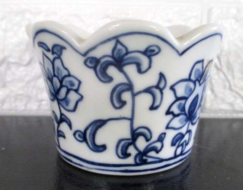 Small Blue and White handpainted fase or planter. No Marked with makers mark. 60mm high.