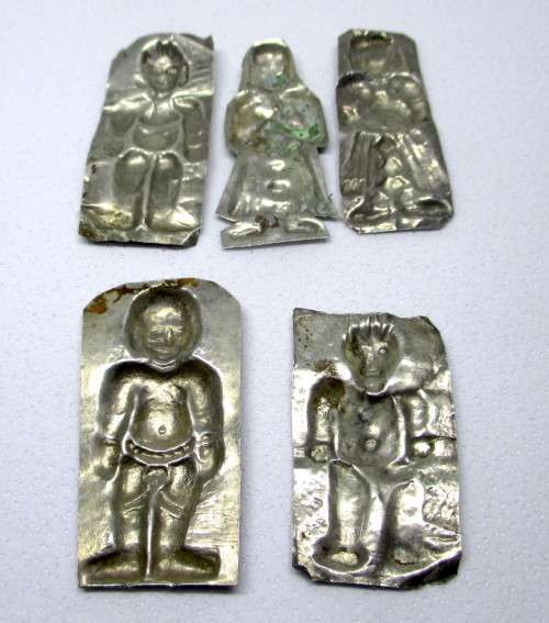 Antique Silver cladding removed from original item. Embossed figures. 9.4g. Ave 50mm long.