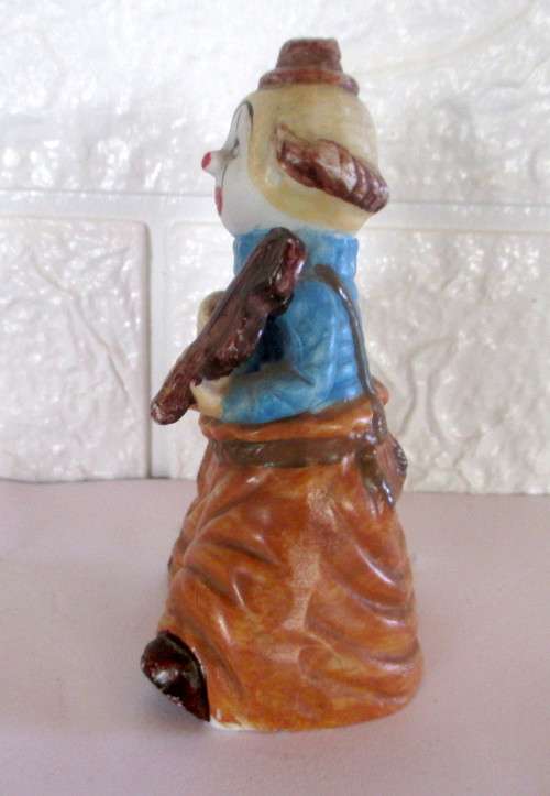 Vintage Unglazed Porcelain Violin playing Clown Figurine. 110mm high. Spotless.