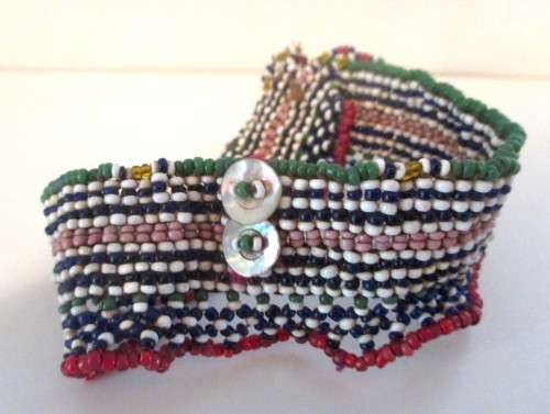 Vintage African Zulu beaded choker with Mother of Pearl buttons. Vibrant colors. Choker 300mm.