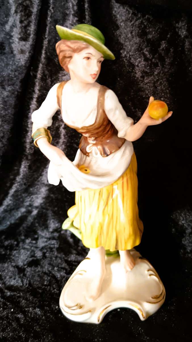 Vintage 1969 Goebel Hummel West Germany figurine of lady picking fruits German painted. 200mm high.