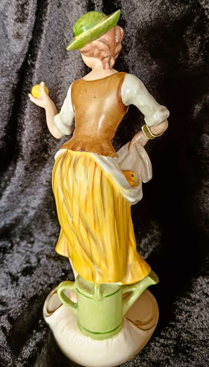 Vintage 1969 Goebel Hummel West Germany figurine of lady picking fruits German painted. 200mm high.