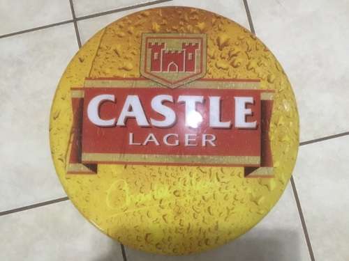 Castle lager disk sign