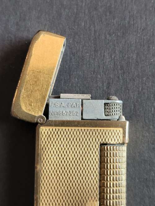 Dunhill Lighter made in Switzerland (needs flint and gas) - as per photograph