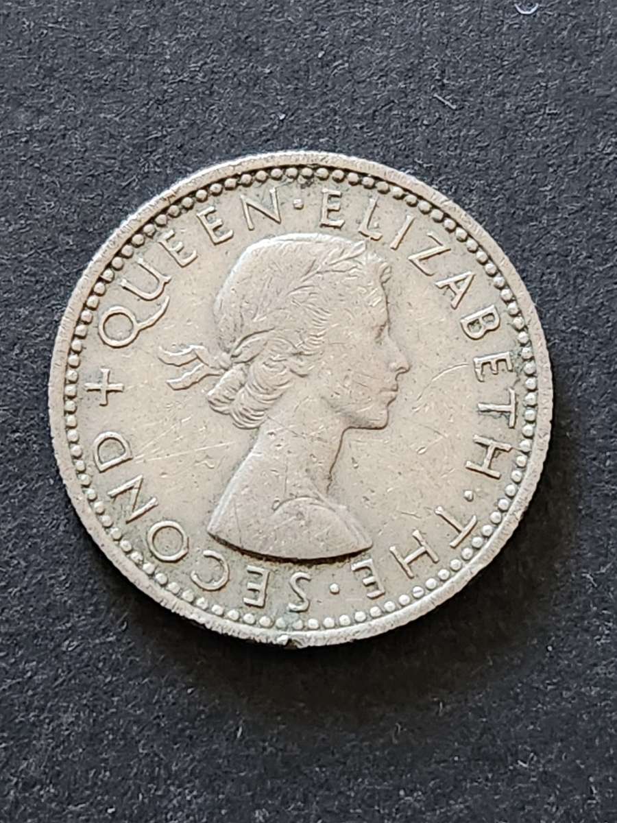 Rhodesia and Nysaland Sixpence 1957 - as per photograph