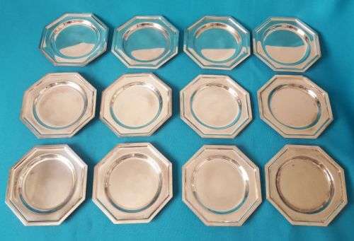 VINTAGE SET OF 12 SILVER PLATED COASTERS
