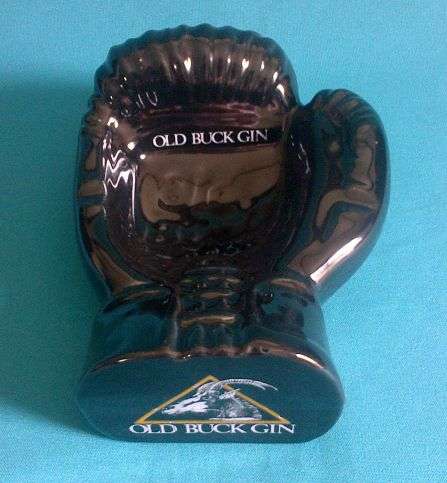 LARGE PORCELAIN "OLD BUCK GIN" BOXING GLOVE-SHAPED ASHTRAY
