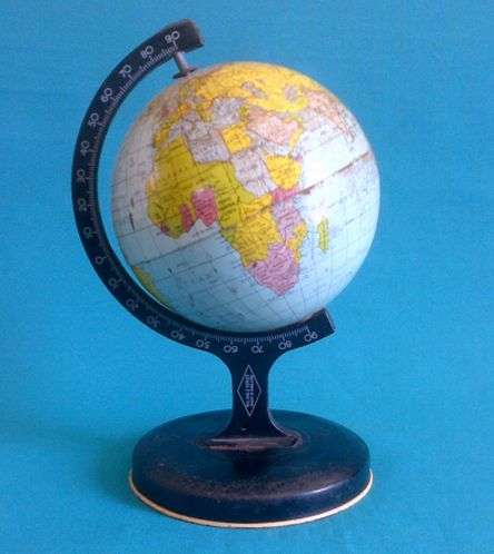 OLD TIN WORLD GLOBE, DEPICTING RHODESIA ETC.