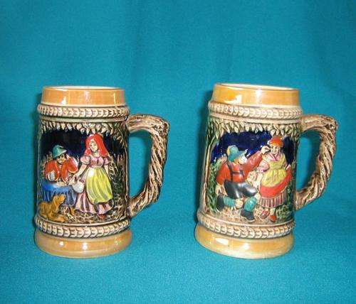 PAIR OF VINTAGE GERMAN BEER MUGS