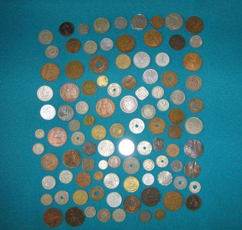 LARGE COLLECTION OF WORLD COINS DATING FROM 1870