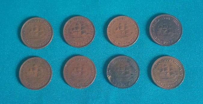 LOT OF 1/2 PENNY COINS