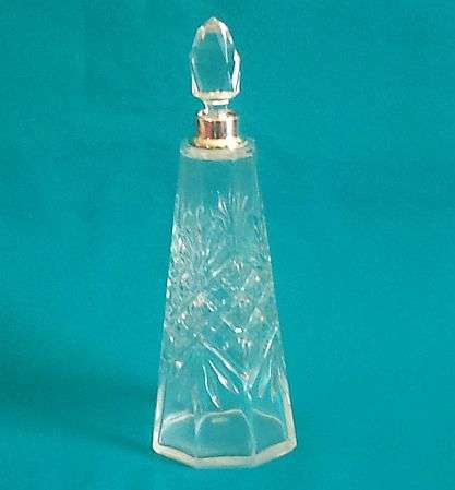 CUT GLASS PERFUME BOTTLE WITH HALLMARKED SILVER COLLAR