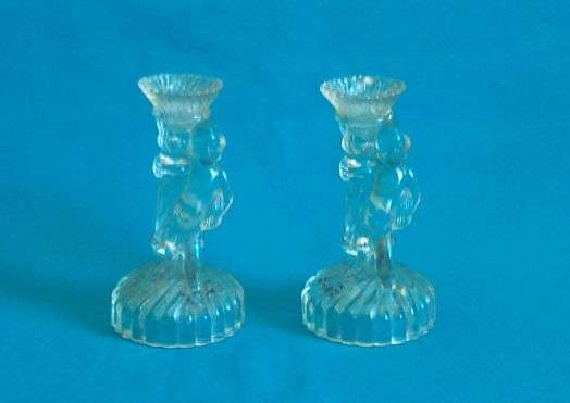 LOVELY PAIR OF GLASS CANDLE STICKS WITH LITTLE BOY FIGURES